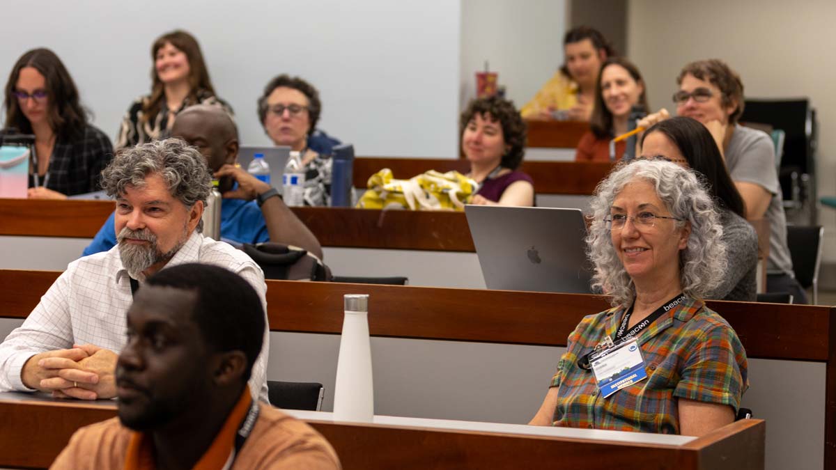 Regional conference attendees learning in a college classroom